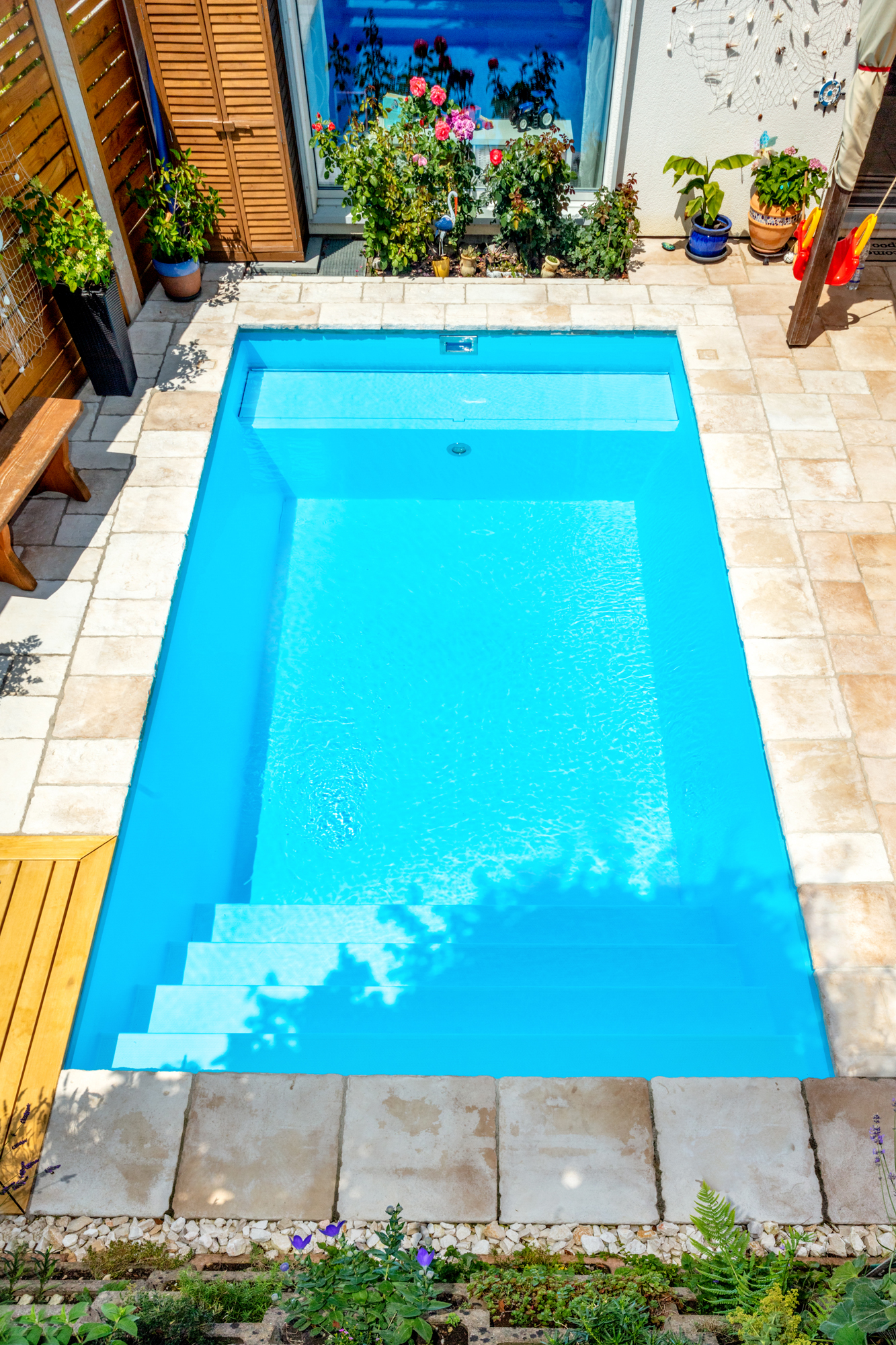 Ebenfalls die Schwimmbadtreppe Malaga im Gartenbad von Veltmann pools